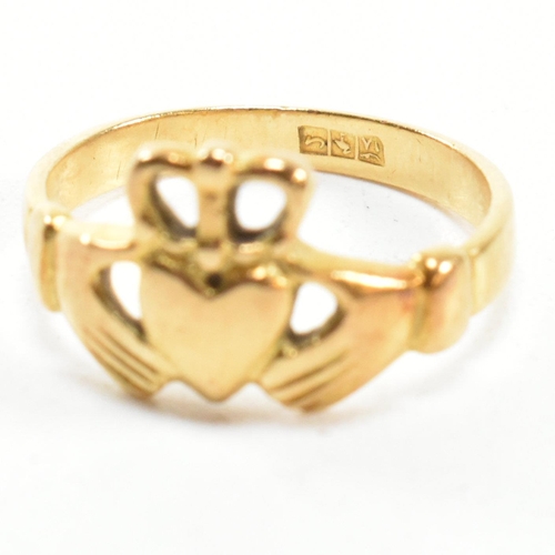 89 - An 18ct gold Claddagh ring. The Irish Claddagh ring bearing Egyptian hallmarks for 18ct gold. Size I... 