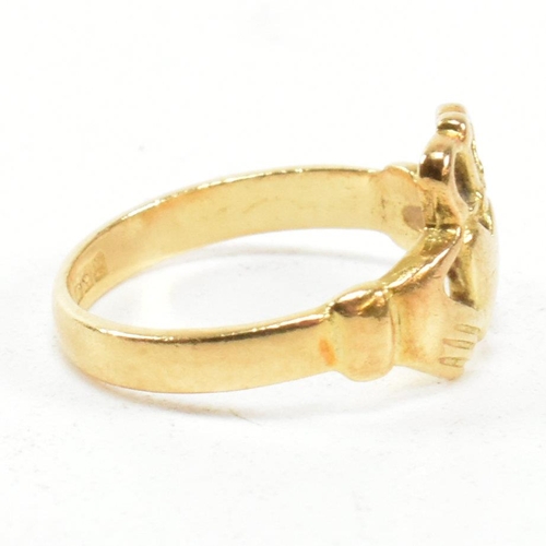 89 - An 18ct gold Claddagh ring. The Irish Claddagh ring bearing Egyptian hallmarks for 18ct gold. Size I... 