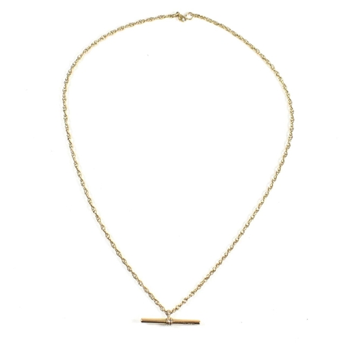 93 - A hallmarked 9ct gold T-bar necklace. The hallmarked Italian T-bar strung on a rope chain to lobster... 