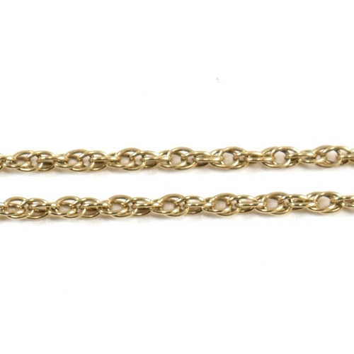 93 - A hallmarked 9ct gold T-bar necklace. The hallmarked Italian T-bar strung on a rope chain to lobster... 