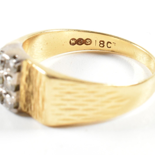 97 - An 18ct gold and diamond ring. The ring set with two rows of three round brilliant cut diamonds to b... 