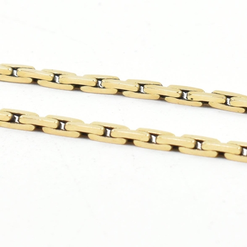 99 - A hallmarked 9ct gold fancy flat link chain. The flat link chain hallmarked for London, 1978. Also m... 