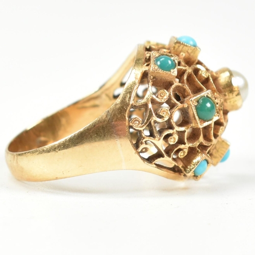 24 - An 18ct gold pearl and turquoise bombe ring. The ring having a pierced filigree style domed head set... 