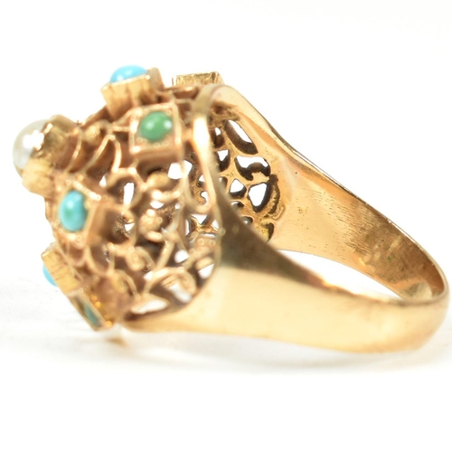 24 - An 18ct gold pearl and turquoise bombe ring. The ring having a pierced filigree style domed head set... 