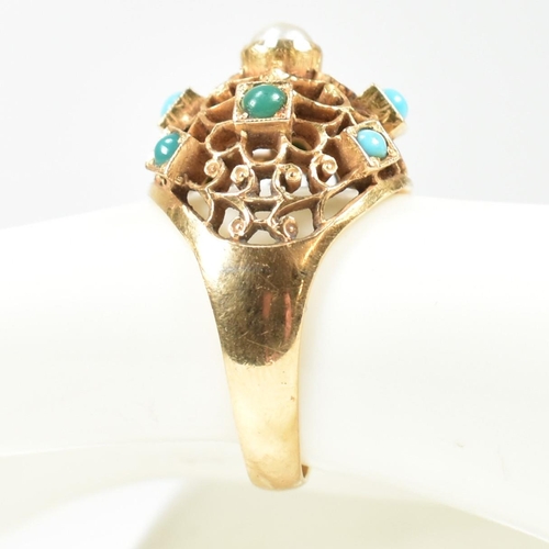 24 - An 18ct gold pearl and turquoise bombe ring. The ring having a pierced filigree style domed head set... 