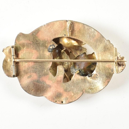 57A - A 19th century gold and pearl brooch pin. The brooch having a floral motif to centre set with a pear... 