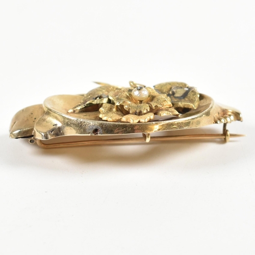 57A - A 19th century gold and pearl brooch pin. The brooch having a floral motif to centre set with a pear... 