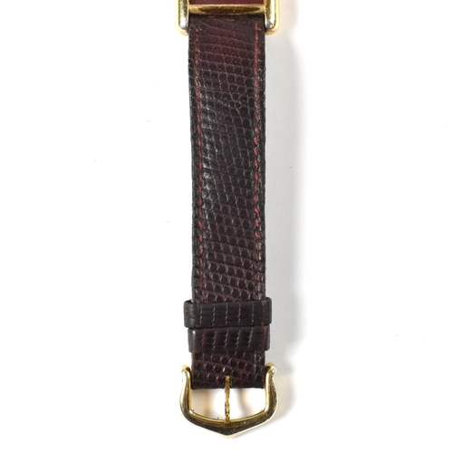 31A - Vintage Must De Cartier tank watch . The watch having a rectangular burgundy dial in a gold plated s... 