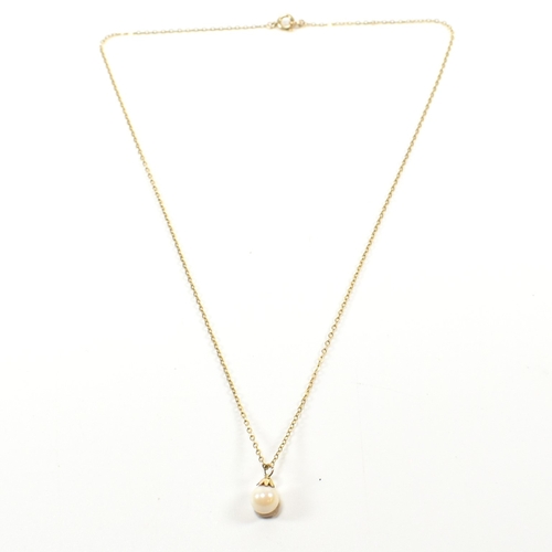 80A - A 9ct gold and pearl pendant necklace. The necklace strung with a cultured pearl to trace chain and ... 