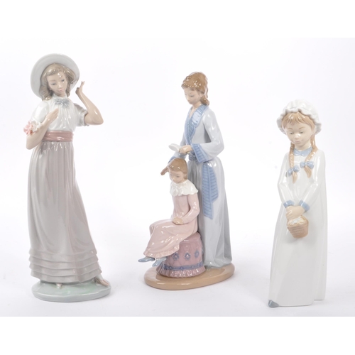 10 - Nao by Lladro - A collection of three 20th Century Nao by Lladro china porcelain figurines to includ... 