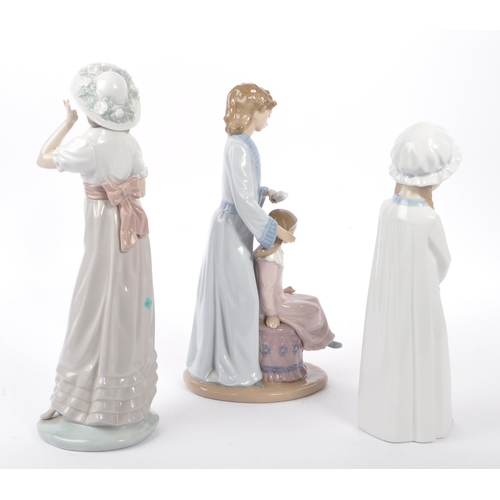 10 - Nao by Lladro - A collection of three 20th Century Nao by Lladro china porcelain figurines to includ... 