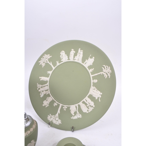 105 - Wedgwood - A collection of 20th century Wedgwood Jasperware Cameo ware in sage green colourway with ... 