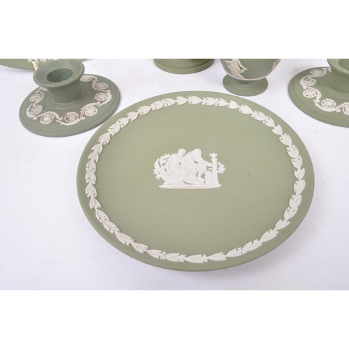 105 - Wedgwood - A collection of 20th century Wedgwood Jasperware Cameo ware in sage green colourway with ... 