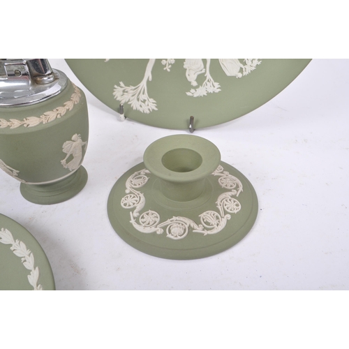 105 - Wedgwood - A collection of 20th century Wedgwood Jasperware Cameo ware in sage green colourway with ... 