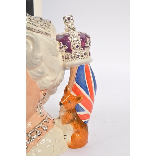 109 - Royal Doulton - A large china character jug in the form of Queen Elizabeth II D7256 released in 2006... 