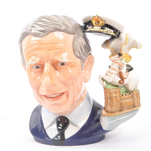 113 - Royal Doulton - A large china character jug in the form of Prince Charles the Prince of Wales D7283 ... 