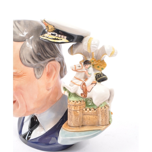 113 - Royal Doulton - A large china character jug in the form of Prince Charles the Prince of Wales D7283 ... 