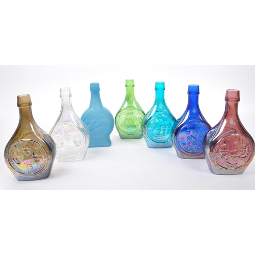 114 - Wheaton Glass - A collection of seven mid 20th century American Wheaton NJ glass commemorative bottl... 