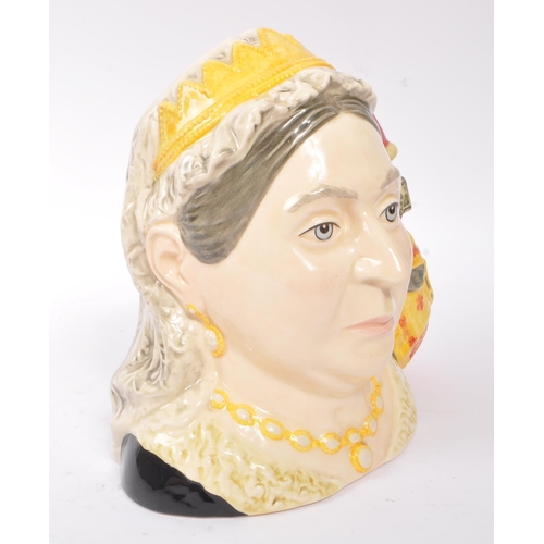 117 - Royal Doulton - A large china Royal Doulton Classics character jug in the form of Queen Victoria D71... 