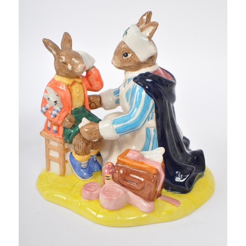 120 - Royal Doulton - A collection of three china porcelain figures to include two Bunnykins comprising of... 