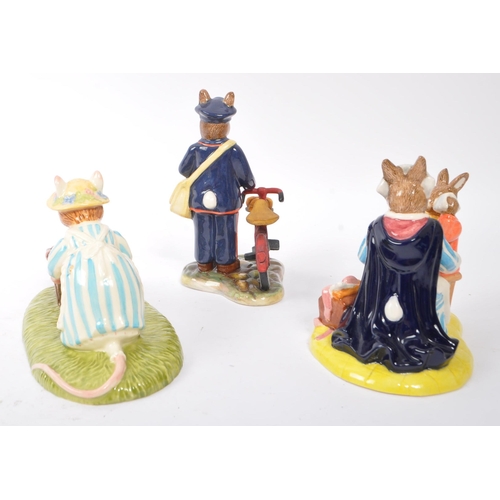 120 - Royal Doulton - A collection of three china porcelain figures to include two Bunnykins comprising of... 