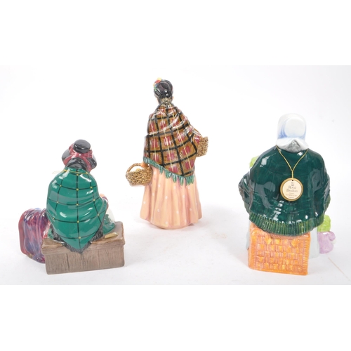 131 - Royal Doulton - A collection of three china porcelain Royal Doulton figurines comprising of The Rag ... 