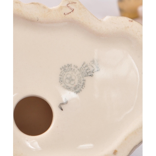 132 - Royal Doulton - A large 20th Century vintage collection of approximately twenty china porcelain Roya... 