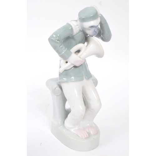 140 - An early 20th Century 1920s art deco French china porcelain figurine in the form of a monkey / chimp... 