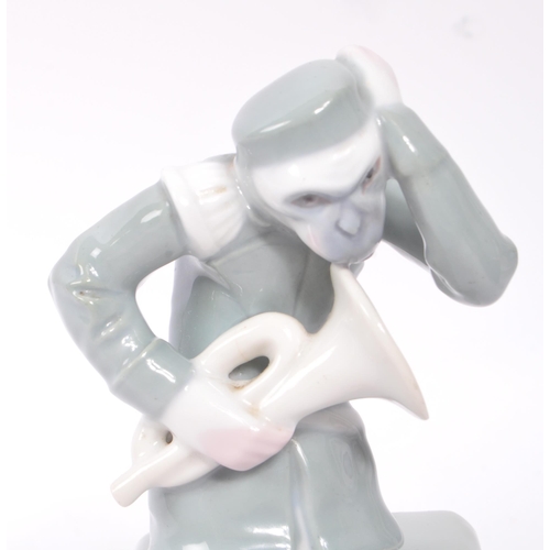 140 - An early 20th Century 1920s art deco French china porcelain figurine in the form of a monkey / chimp... 