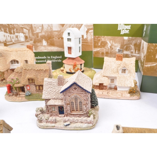 143 - Lilliput Lane - A collection of nineteen 20th Century vintage Lilliput Lane cottage sculpture figure... 