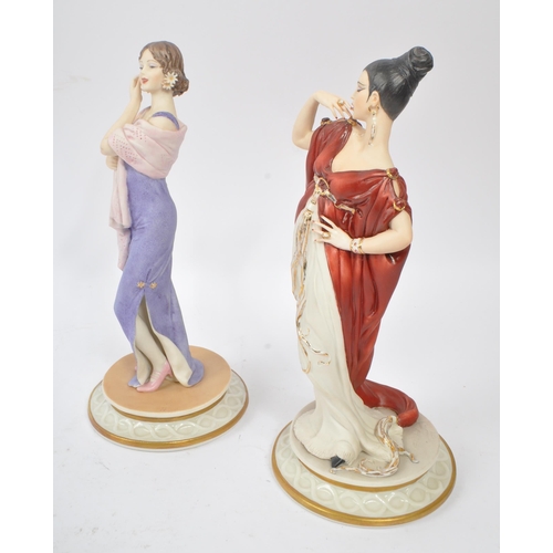 145 - Capodimonte - Two china porcelain Mode Liberty Capodimonte figurines comprising of a lady with dark ... 