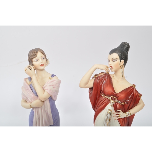 145 - Capodimonte - Two china porcelain Mode Liberty Capodimonte figurines comprising of a lady with dark ... 