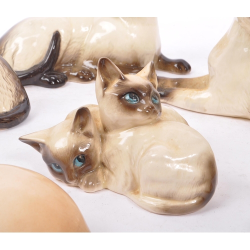 147 - Royal Doulton - A collection of six 20th Century vintage china porcelain Royal Doulton siamese cat f... 