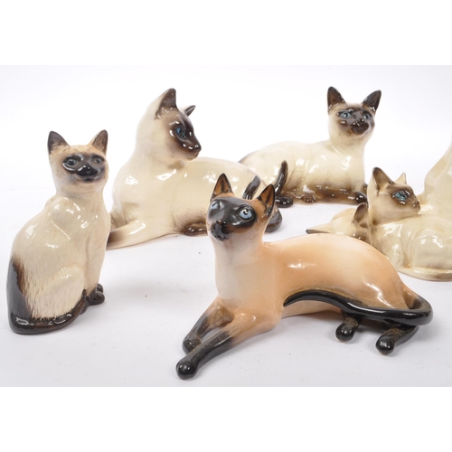 147 - Royal Doulton - A collection of six 20th Century vintage china porcelain Royal Doulton siamese cat f... 