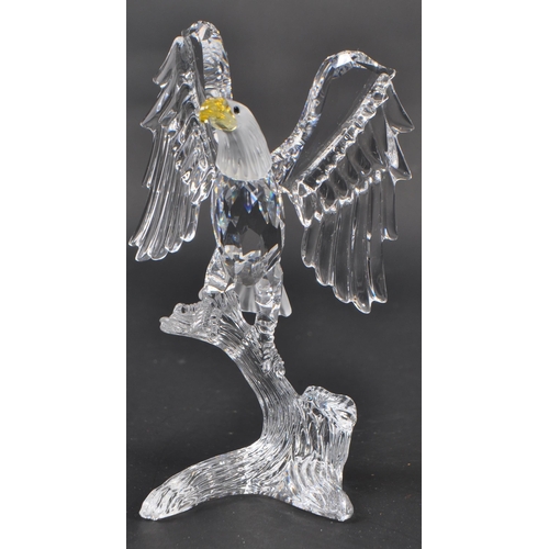 149 - Swarovski - A crystal glass Swarovski ' feathered friends ' figurine in the form of a bald eagle wit... 