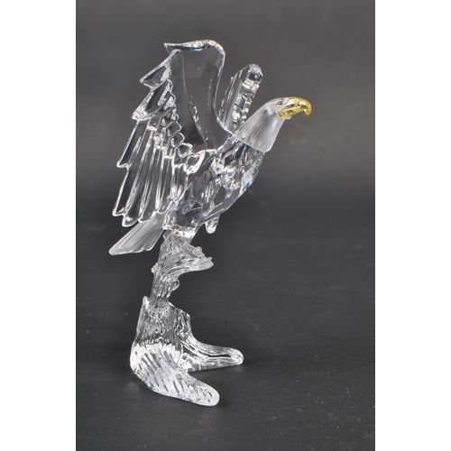 149 - Swarovski - A crystal glass Swarovski ' feathered friends ' figurine in the form of a bald eagle wit... 