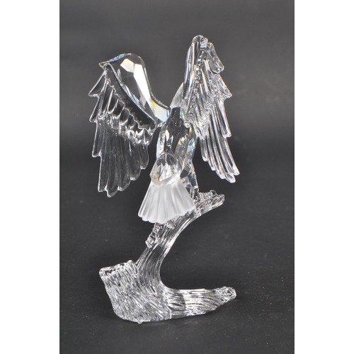 149 - Swarovski - A crystal glass Swarovski ' feathered friends ' figurine in the form of a bald eagle wit... 