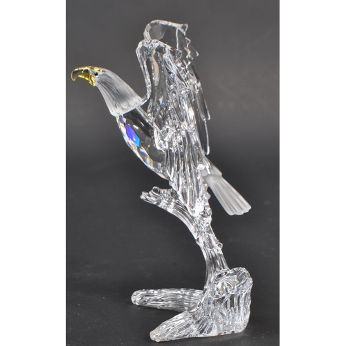 149 - Swarovski - A crystal glass Swarovski ' feathered friends ' figurine in the form of a bald eagle wit... 