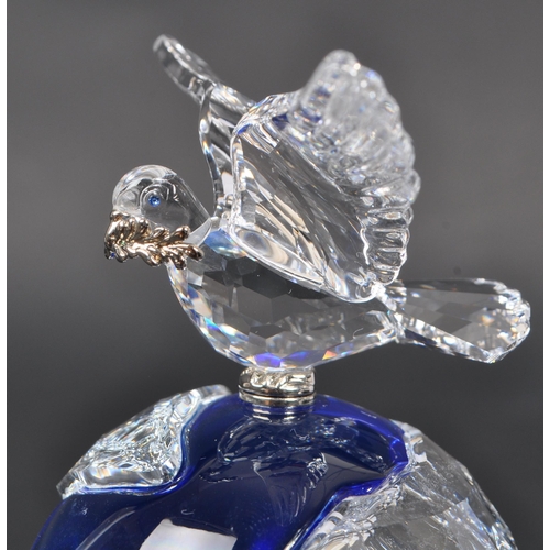 150 - Swarovski - Two crystal glass Swarovski figurines / ornaments comprising of a boxed Millenium editio... 