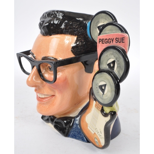 152 - Royal Doulton - A large china Royal Doulton character jug in the form of Buddy Holly D7100 issued in... 