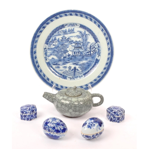 16 - A collection of Chinese porcelain items to include a small crackle glaze teapot, a blue and white pl... 