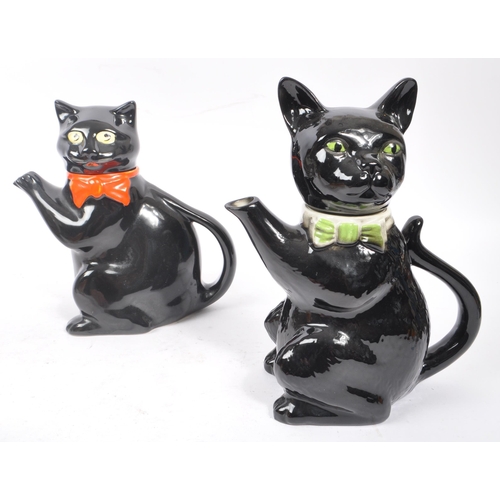 167 - Wood & Sons Burslem / Tony Wood - A collection of four 20th Century vintage china cat figures and te... 