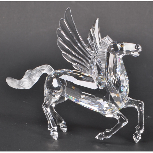 170 - Swarovski - A crystal glass Swarovski figurine / ornament in the form of a Pegasus 216327 having win... 