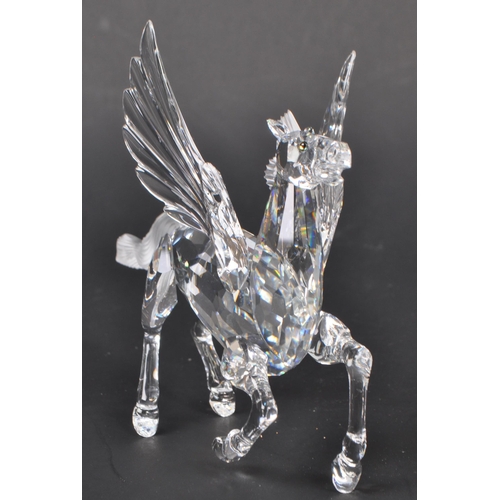 170 - Swarovski - A crystal glass Swarovski figurine / ornament in the form of a Pegasus 216327 having win... 