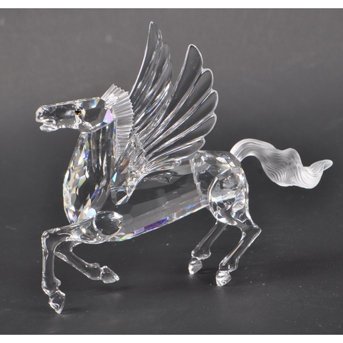 170 - Swarovski - A crystal glass Swarovski figurine / ornament in the form of a Pegasus 216327 having win... 