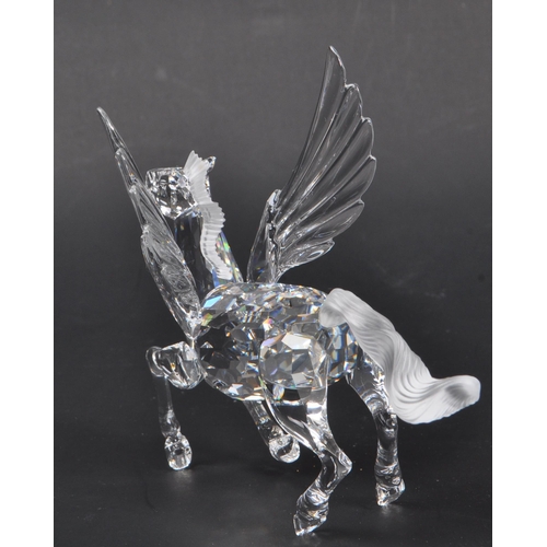 170 - Swarovski - A crystal glass Swarovski figurine / ornament in the form of a Pegasus 216327 having win... 