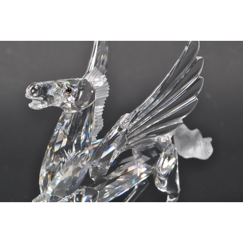 170 - Swarovski - A crystal glass Swarovski figurine / ornament in the form of a Pegasus 216327 having win... 