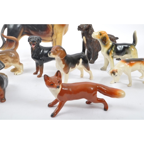 172 - Beswick - A collection of 20th Century vintage china porcelain figurines in the form of dogs compris... 