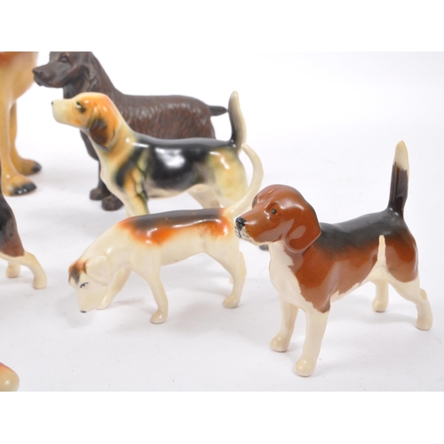 172 - Beswick - A collection of 20th Century vintage china porcelain figurines in the form of dogs compris... 