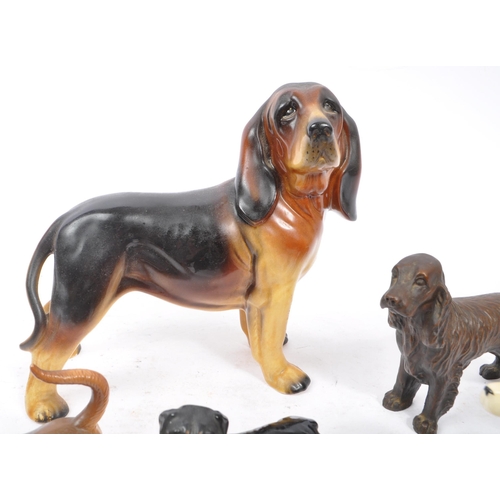 172 - Beswick - A collection of 20th Century vintage china porcelain figurines in the form of dogs compris... 